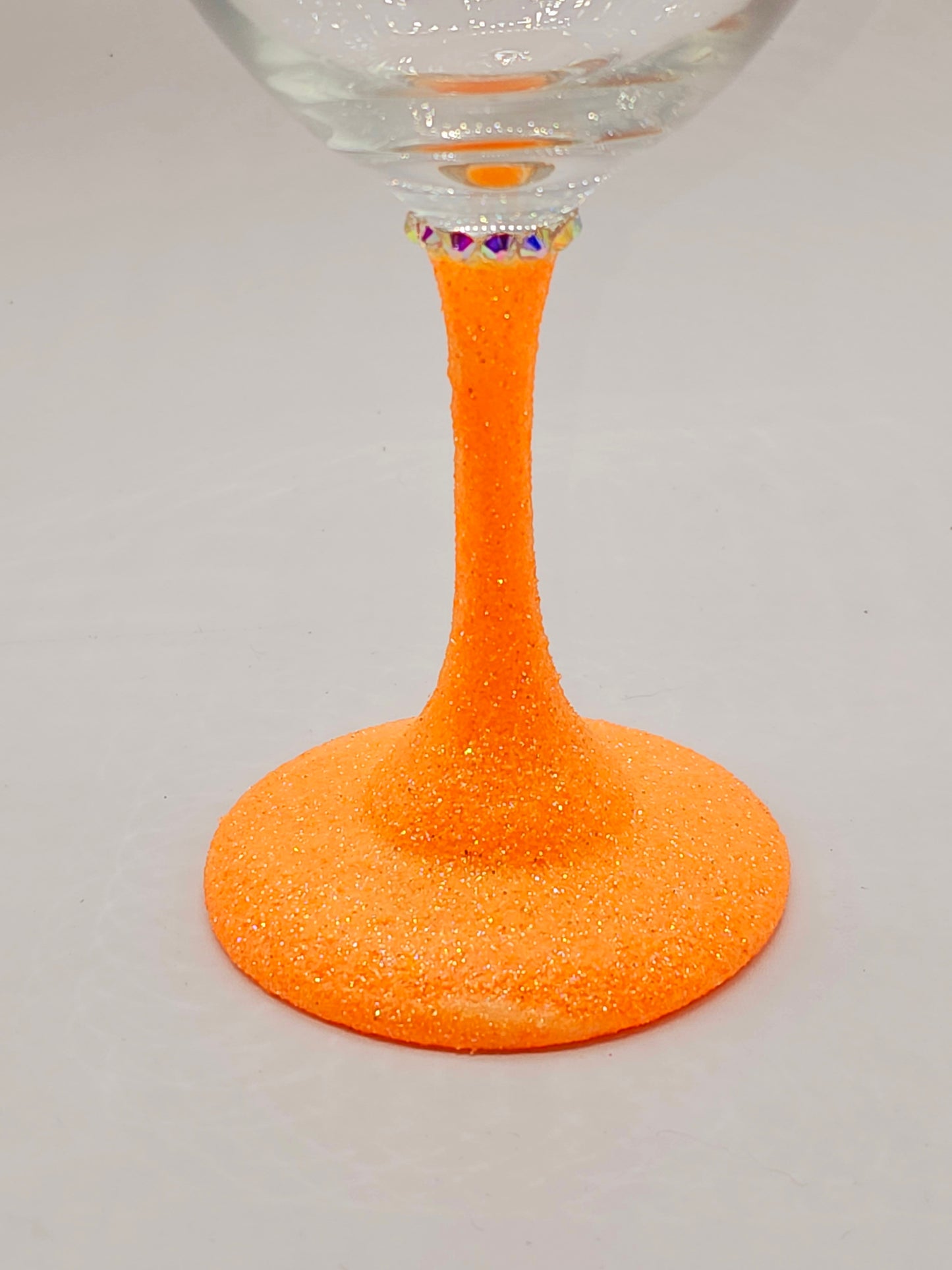 Wine Diva wine glass with orange glitter stem